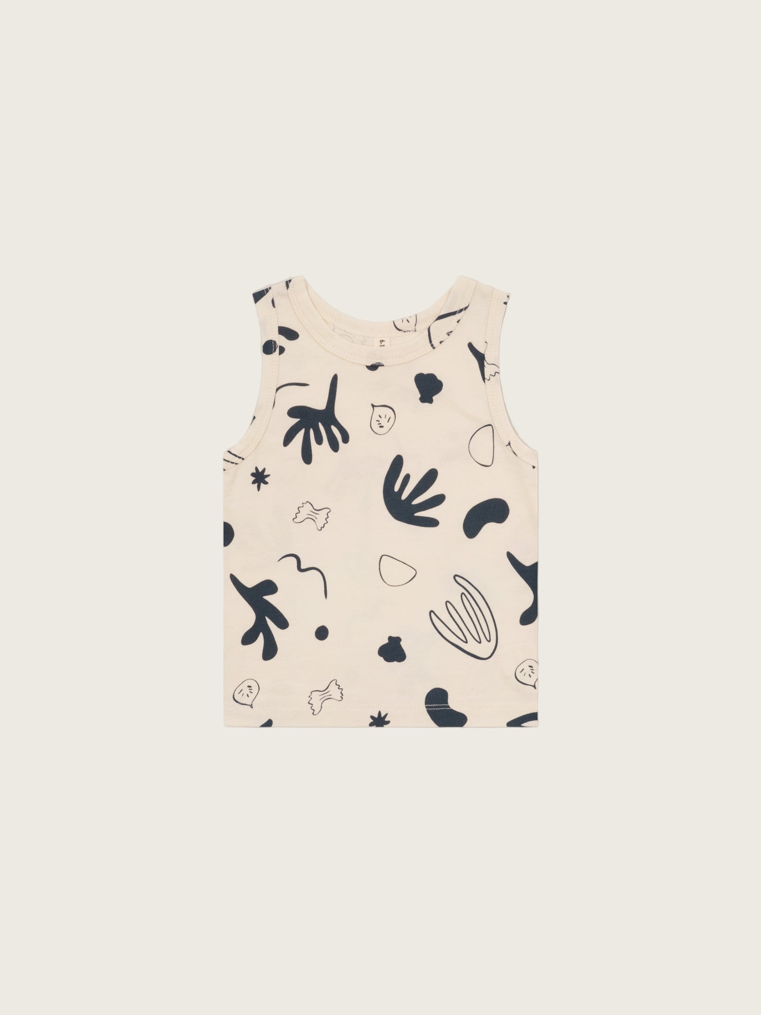 baby and toddler white capri summer vest in undyed cotton with navy ocean print
