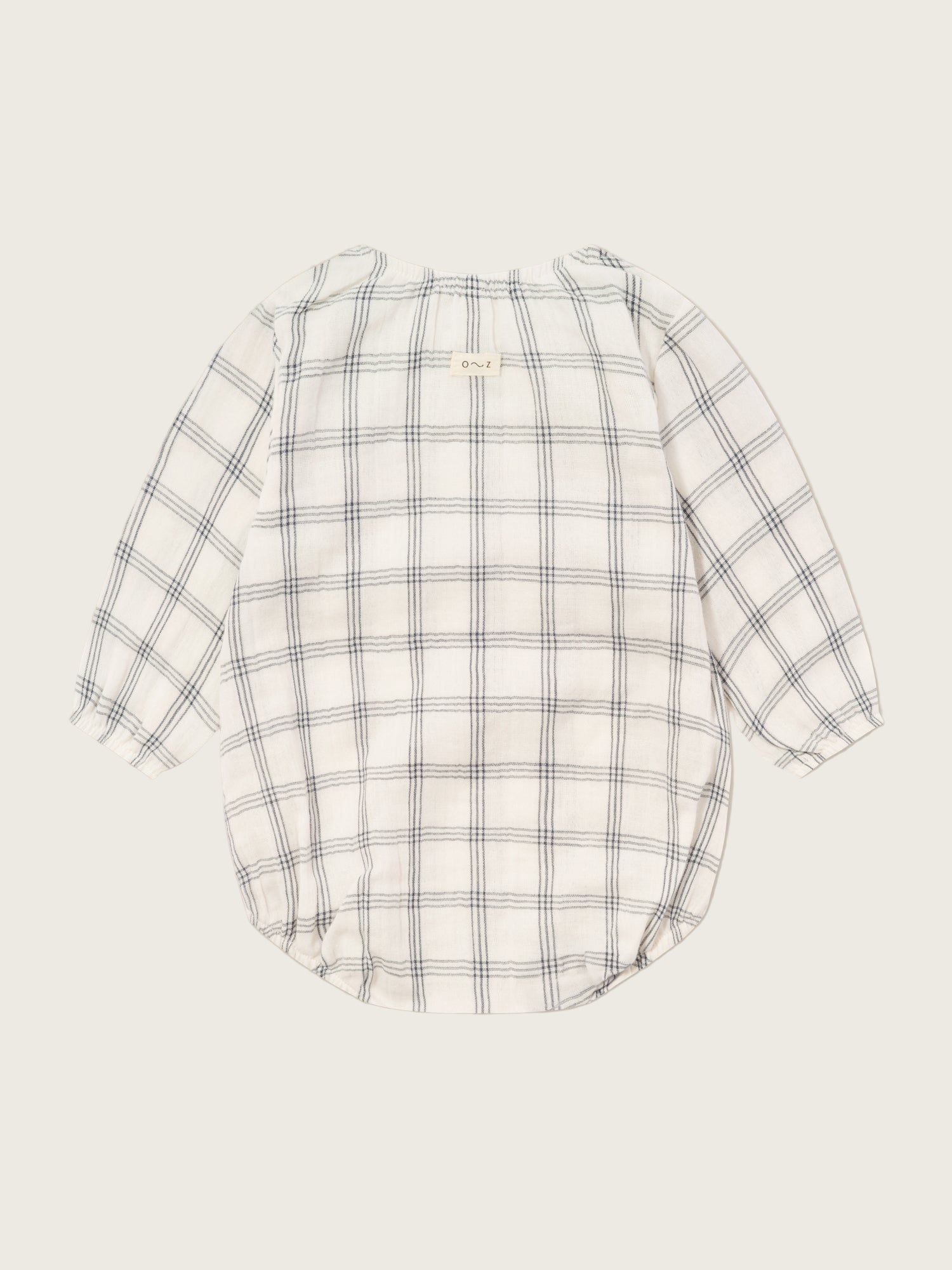 baby white window check long sleeved muslin bodysuit with gathered neckline & cuffs, crotch poppers