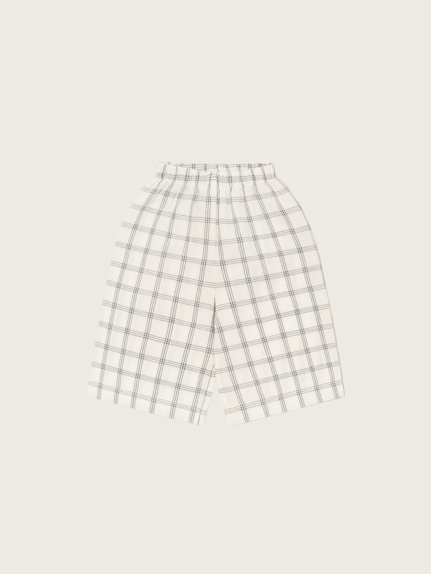 toddler wide leg organic muslin trousers in white with navy window check print & elastic waistband