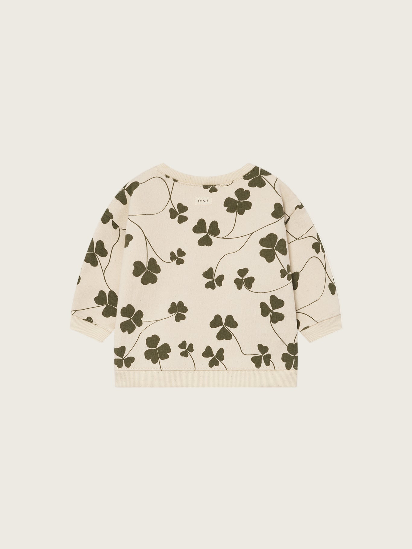 baby cream undyed cotton sweatshirt with green clover print and two shoulder buttons