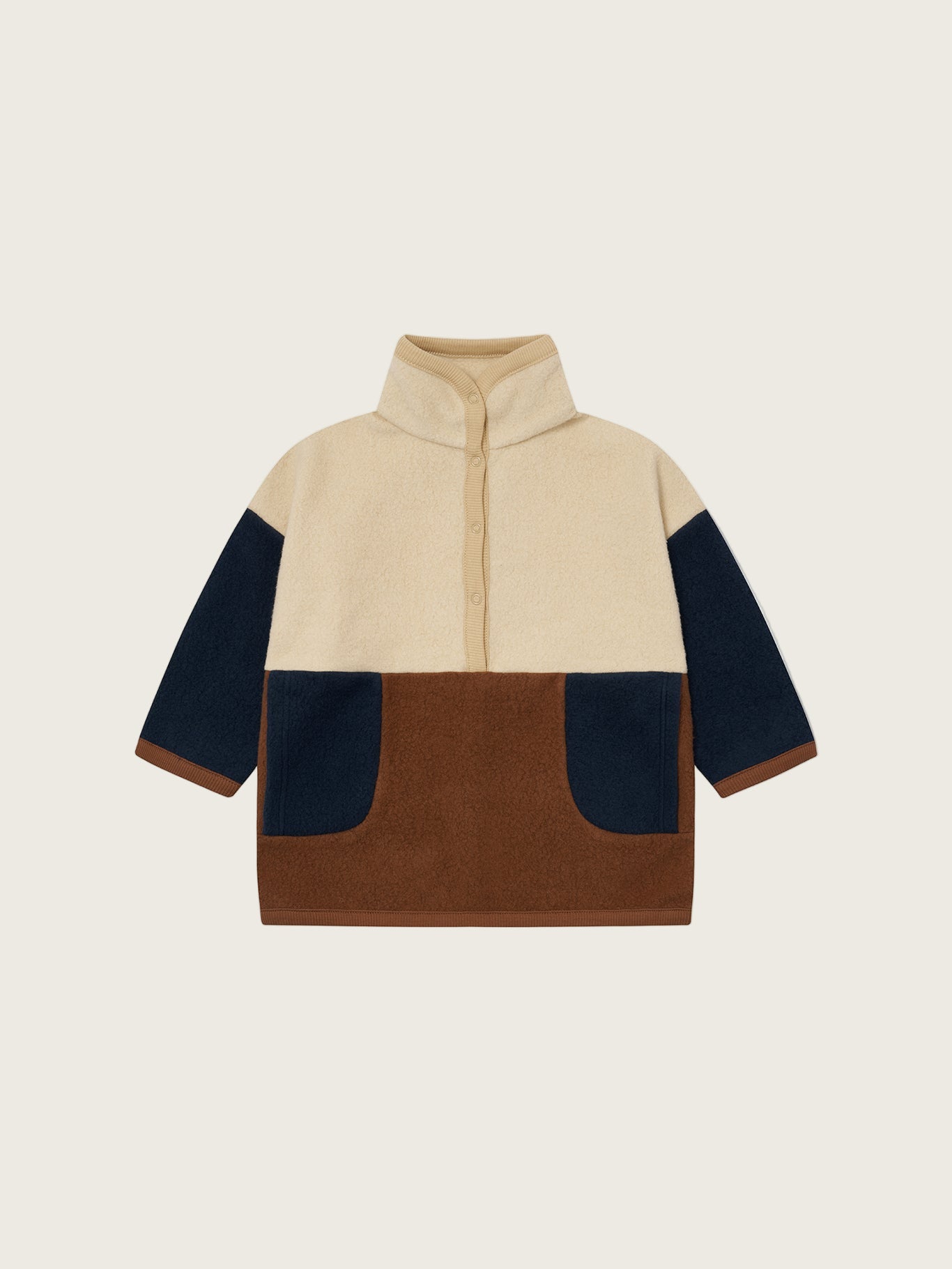 toddler organic fleece colour block cream sweater with brown and navy details, and front poppers