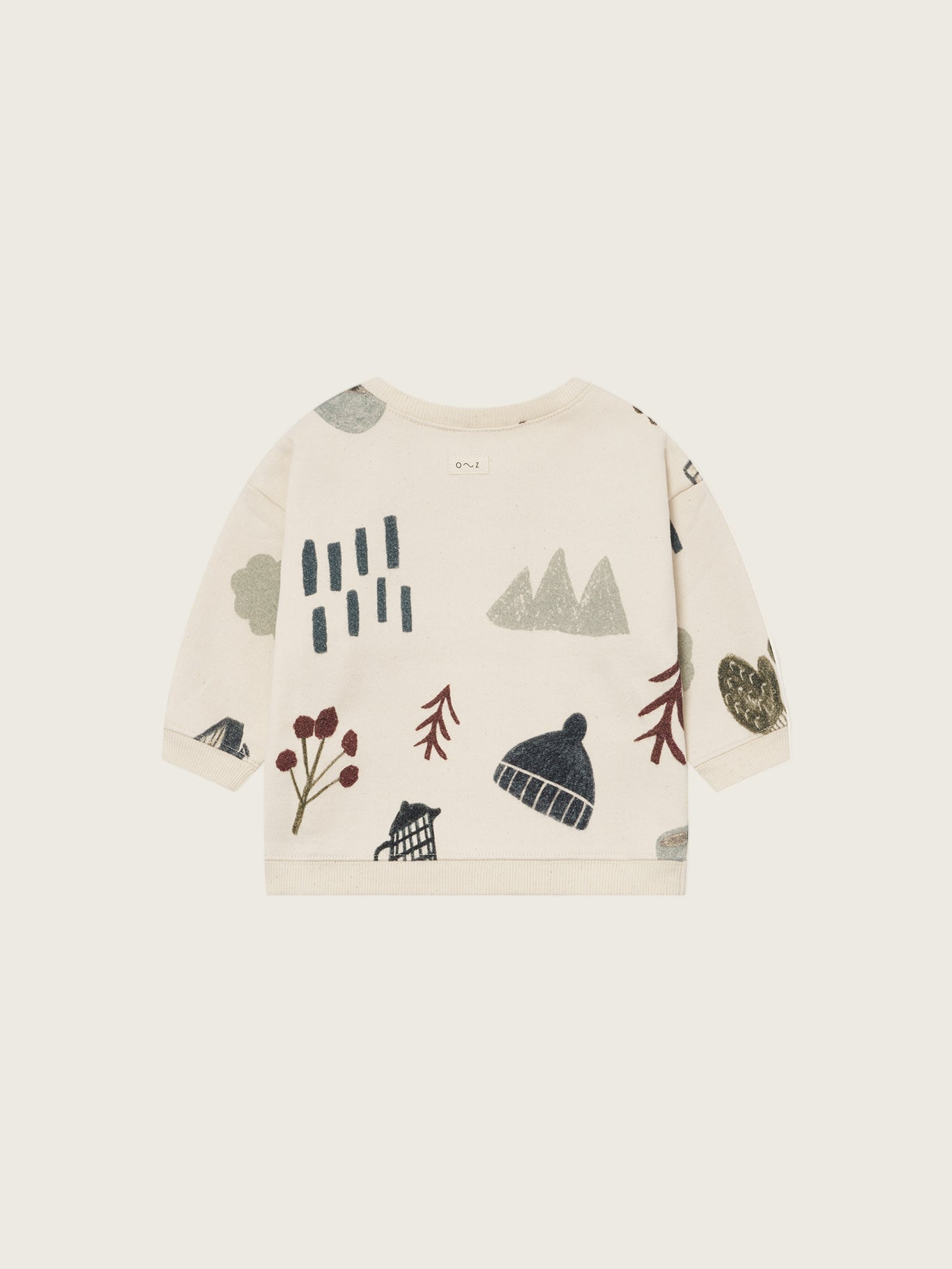 baby cream undyed cotton sweatshirt with shoulder buttons, and nature-themed graphics of trees and leaves