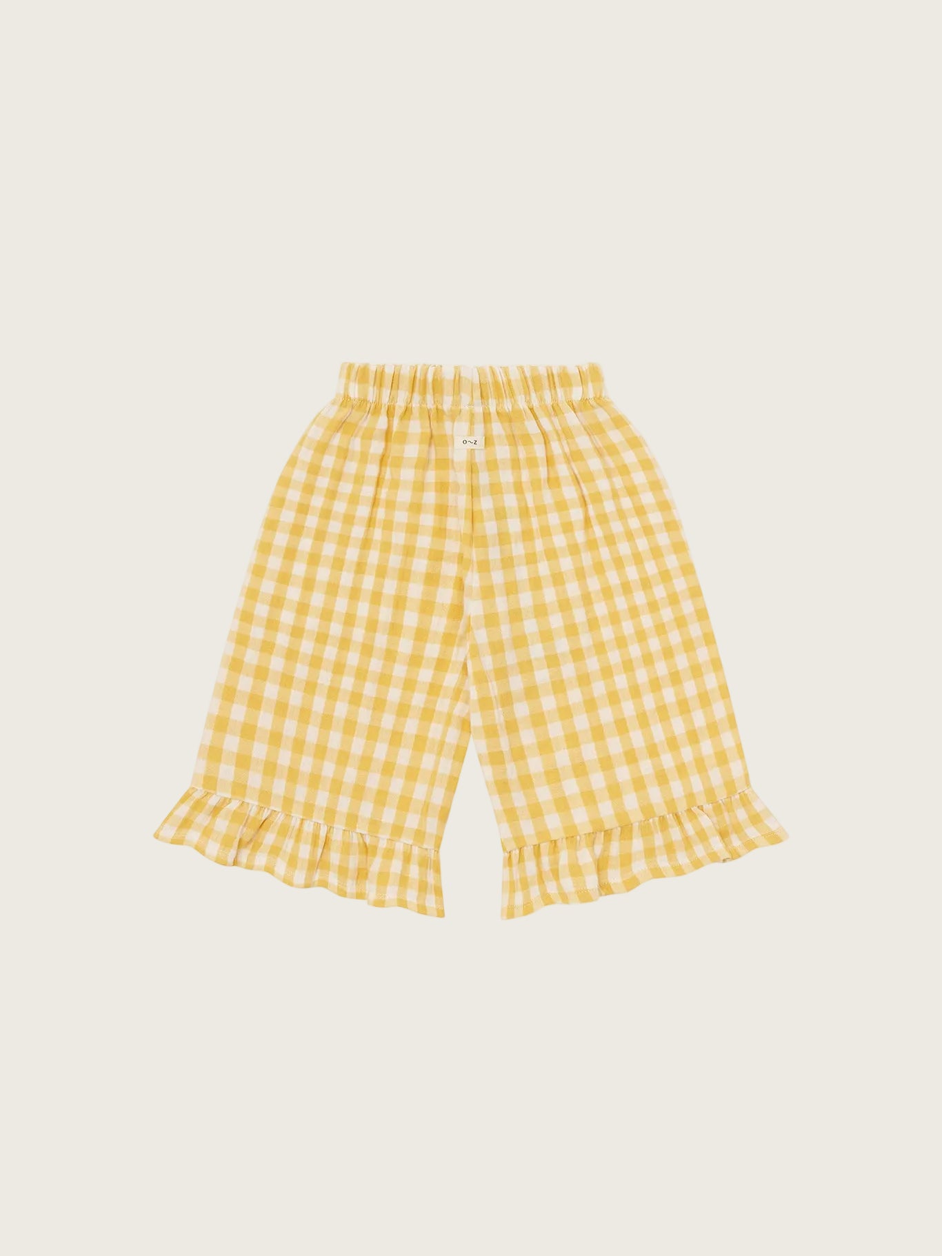 Yellow checkered pants on a white background