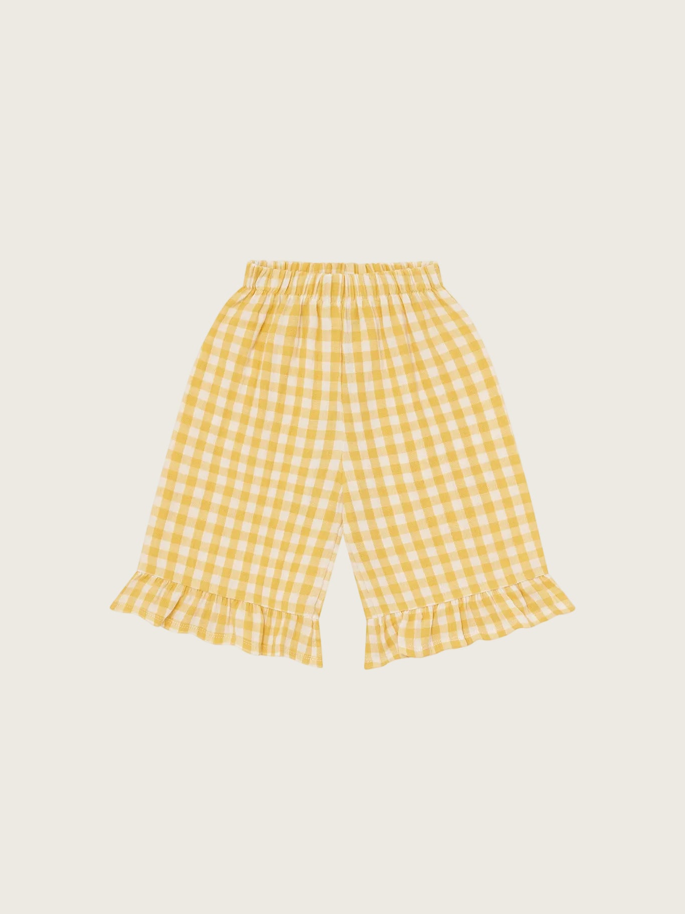Yellow gingham check culottes on a white background