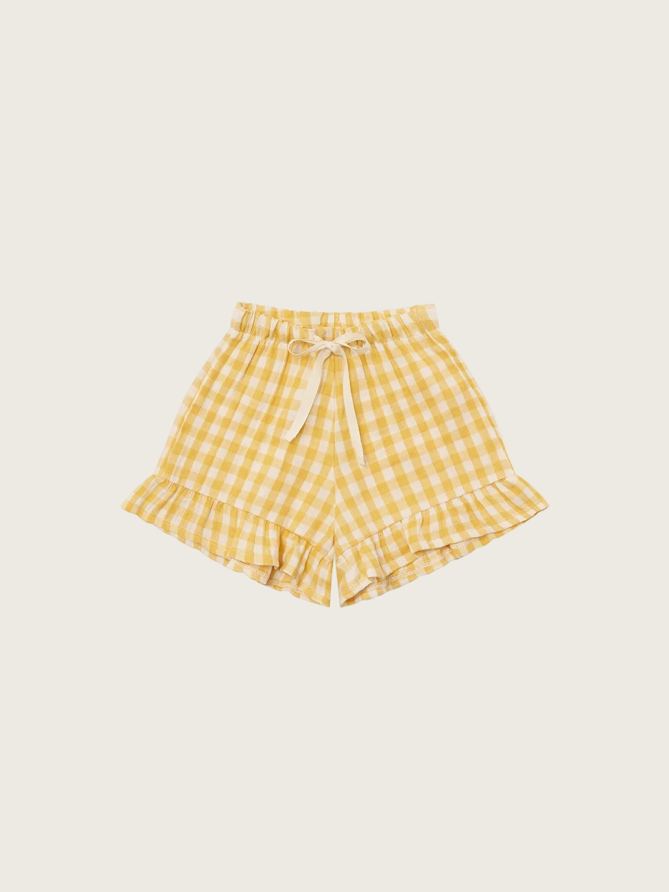 Yellow checkered shorts on a white background