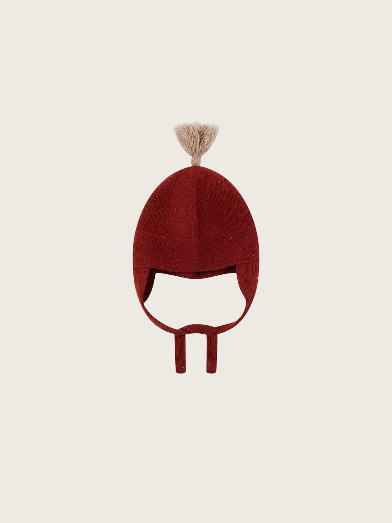 baby and toddler wool hat in paprika red with oatmeal tassel and chin tie