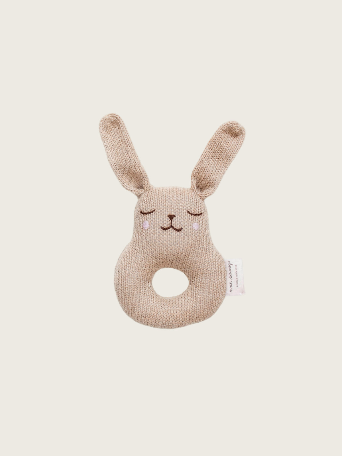 Knitted bunny rattle toy