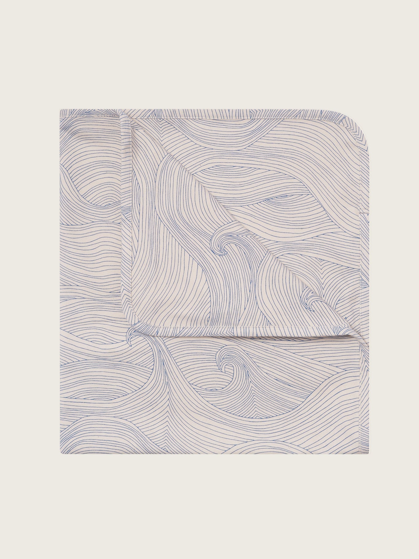 baby and toddler cream undyed cotton reversible blanket with blue seascape line-drawn ocean waves