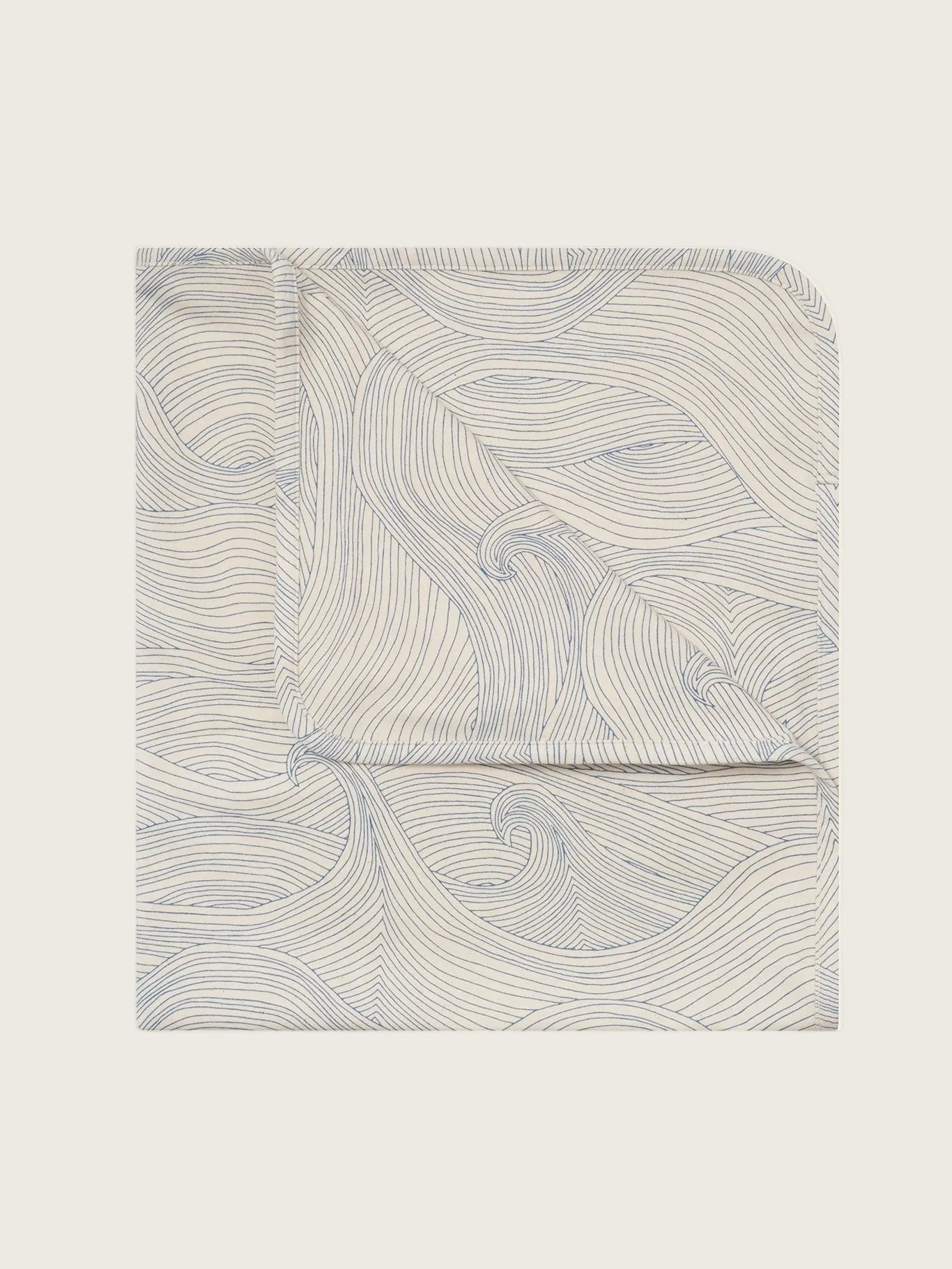 baby and toddler cream undyed cotton reversible blanket with blue seascape line-drawn ocean waves