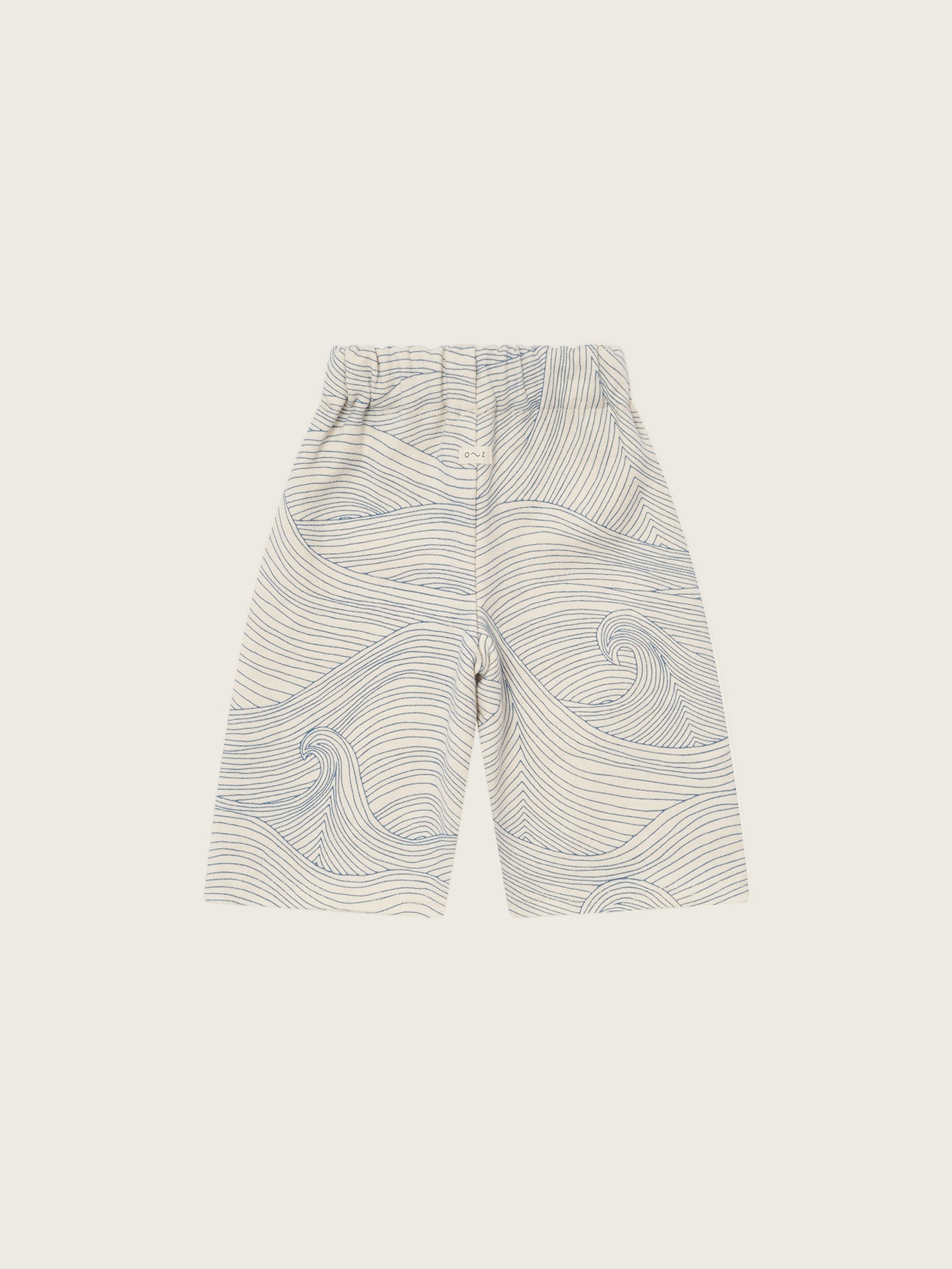 baby and toddler cream undyed cotton wide leg drawstring pants with blue line-drawn ocean waves