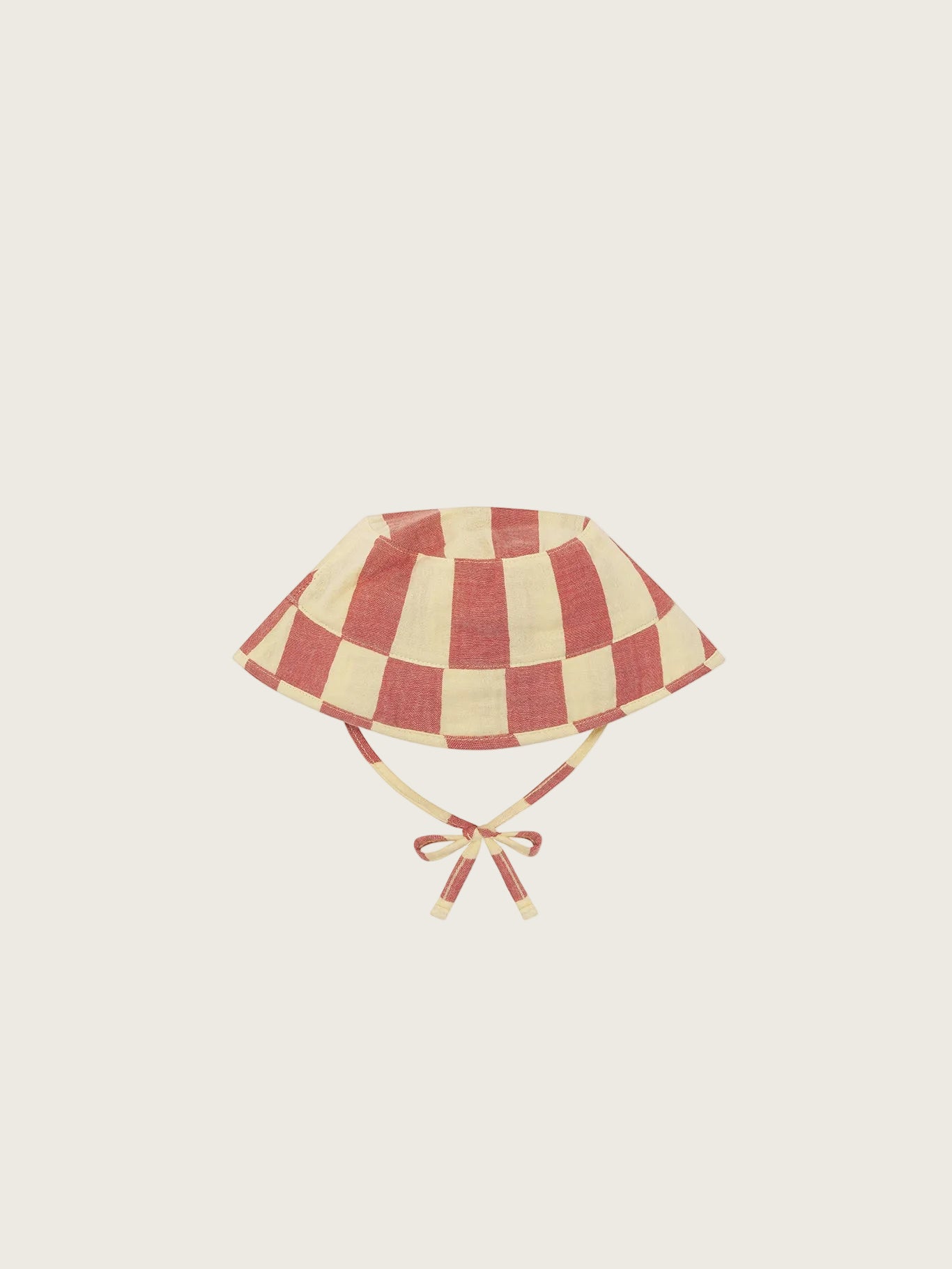 Red and beige checkered sun hat with a bow on a white background