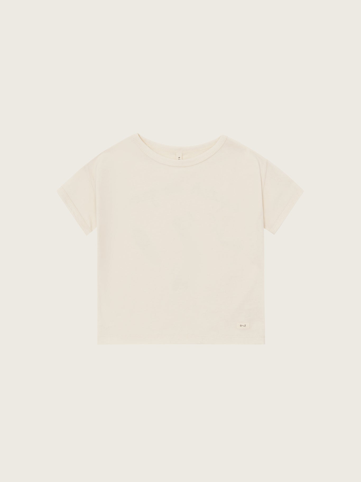 Beige t-shirt on a light beige background