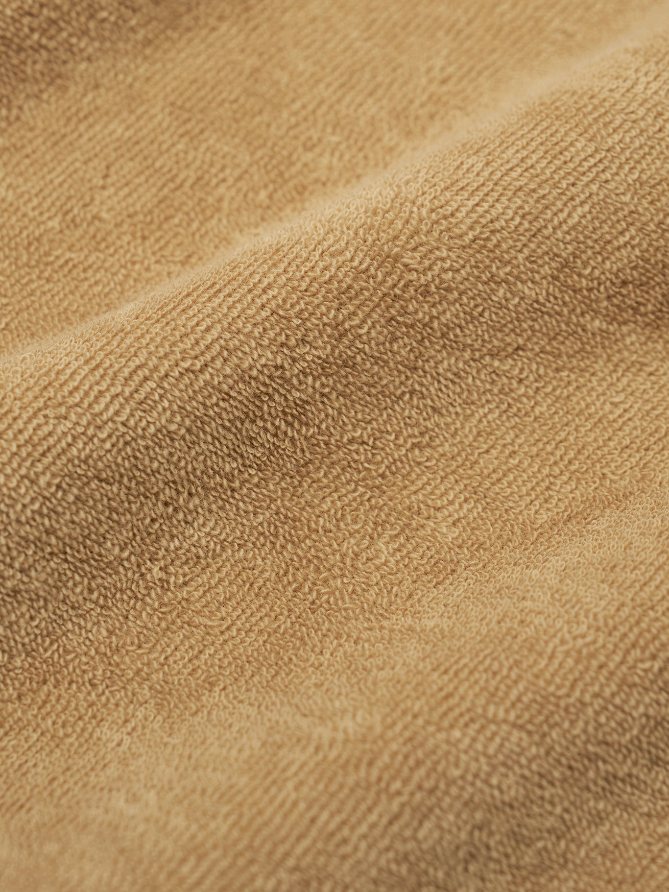 Close-up of wheat cotton terry fabric texture