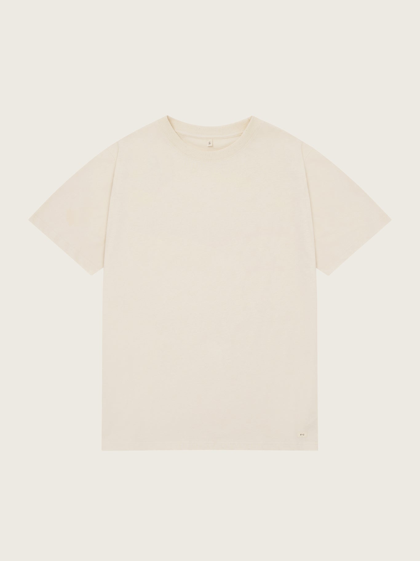 Beige t-shirt on a light beige background