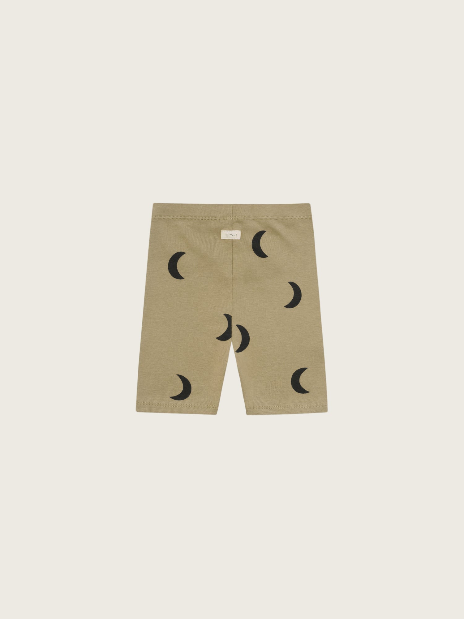 toddler dusky beige organic ribbed cotton biker shorts with black crescents