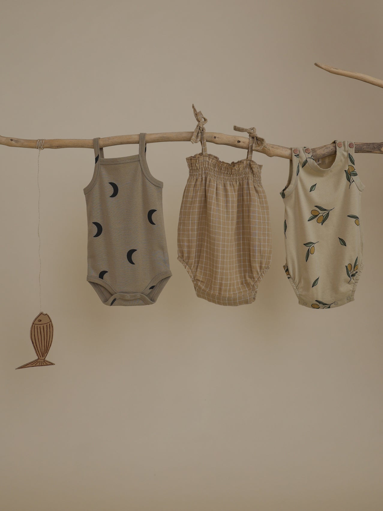 organic sleeveless baby bodysuits on branch, with baby gold grid check spaghetti shoulder tie strap muslin bodysuit