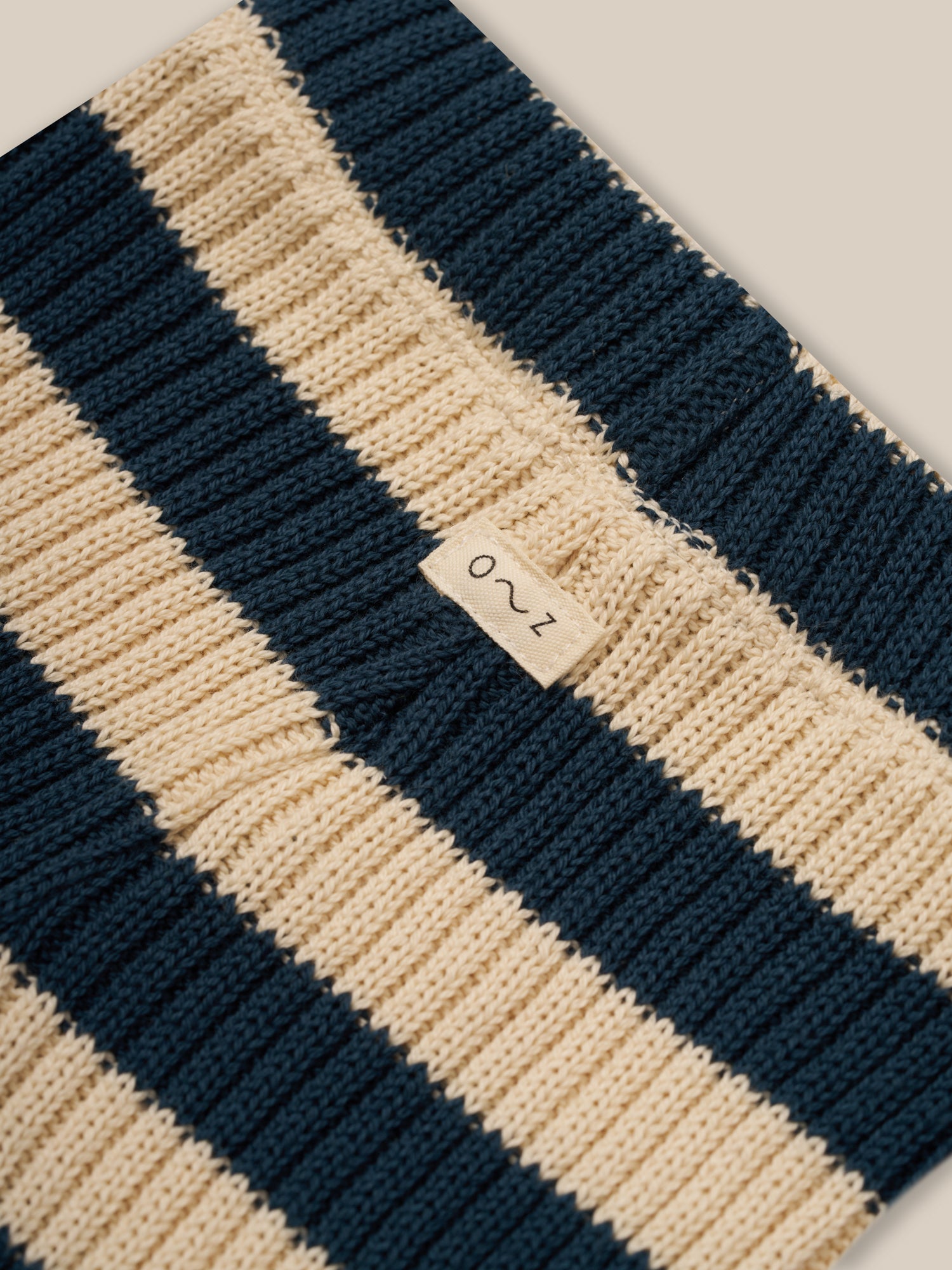 close up of baby & toddler sailor navy striped rib knitted shorts with o~z label