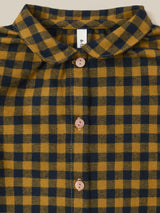 close up of checkered navy & yellow gingham boxy button down flannel shirt with round collar