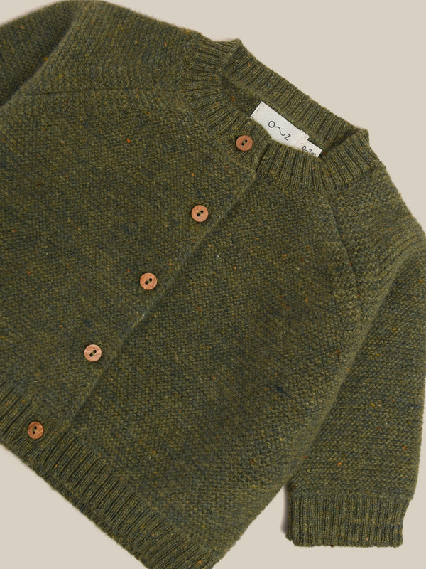 close up of button down wool cardigan in dark green 