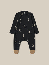 baby & toddler footed suit in black with cream moons beige feet & popper-down front