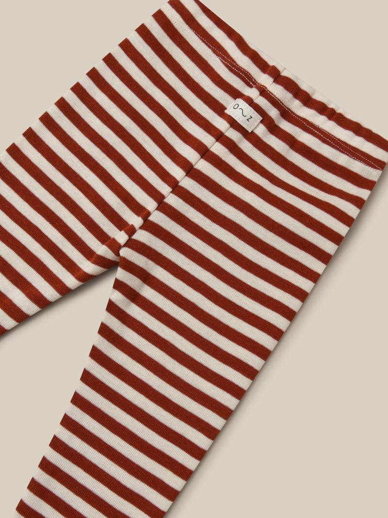 close up of ribbed cotton leggings in red and white stripes