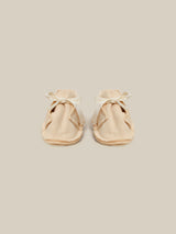 baby and toddler terry cotton booties in cream with white bow