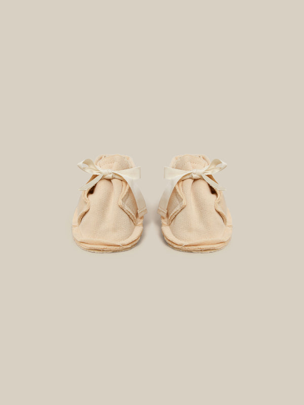 baby and toddler terry cotton booties in cream with white bow