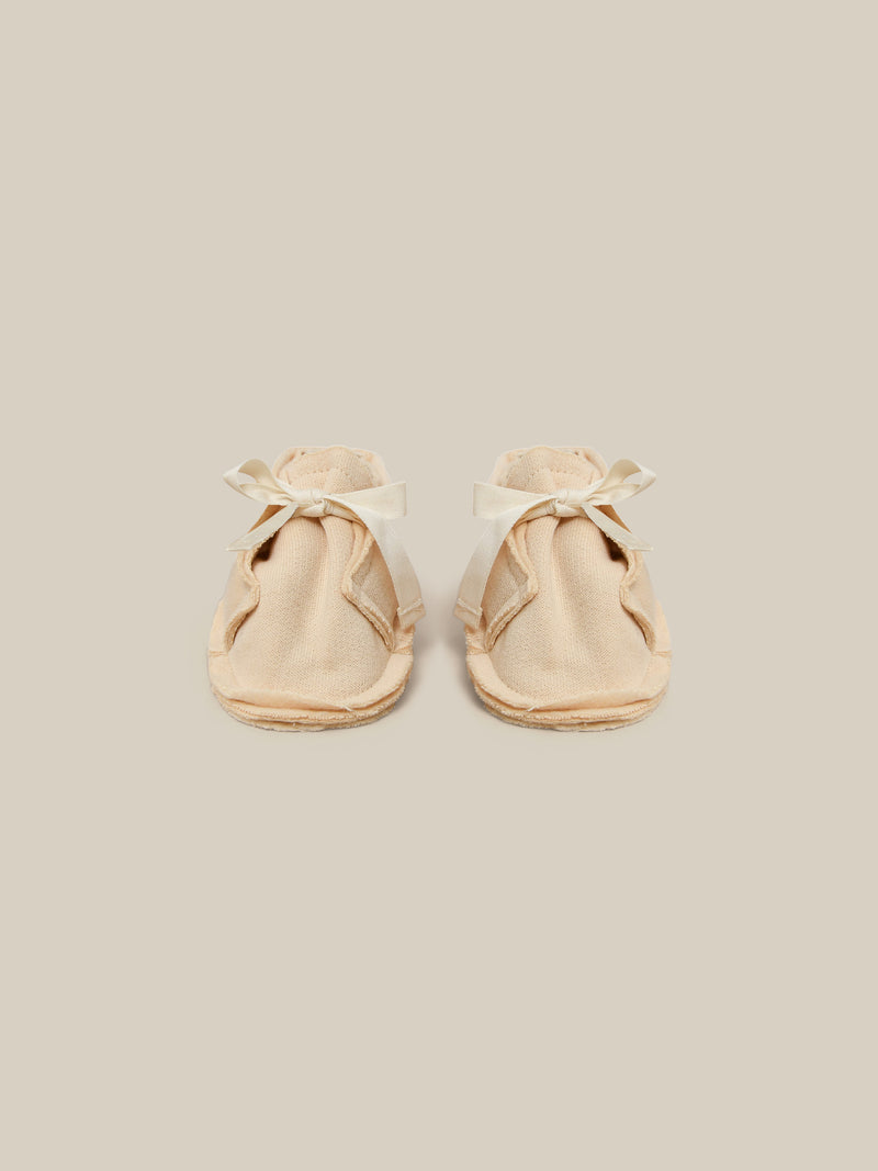 baby and toddler terry cotton booties in cream with white bow