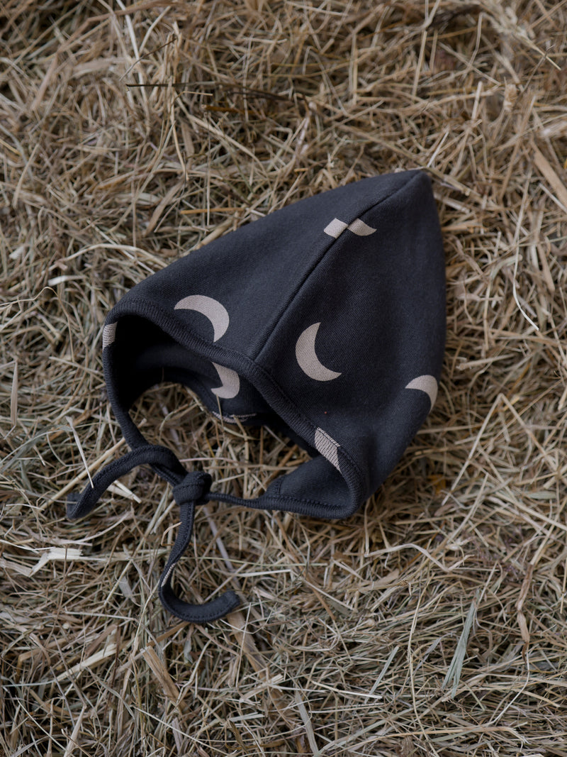 baby & toddler black pixie bonnet with black moons & chin tie on farm straw