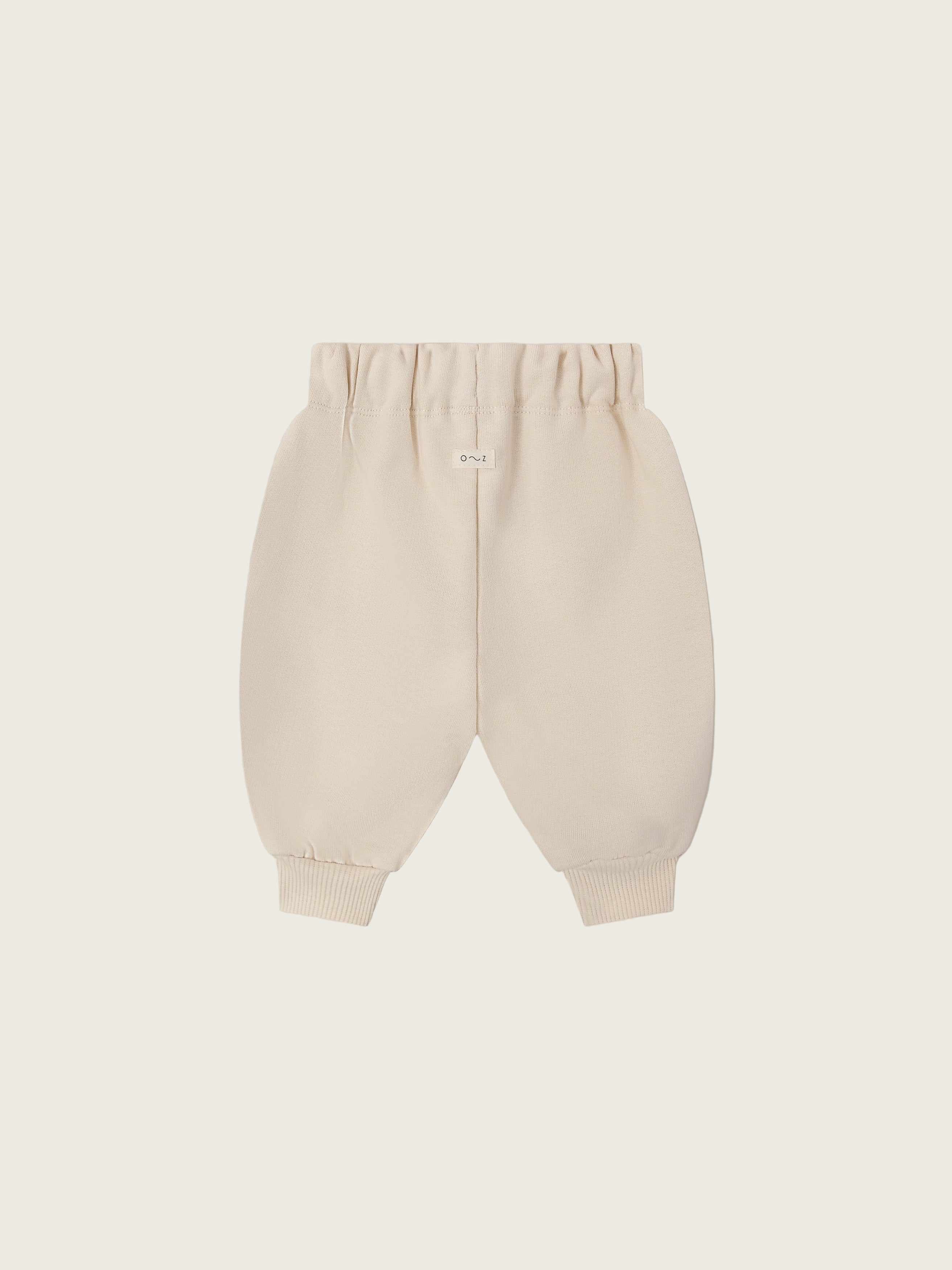 baby and toddler undyed cotton drawstring sweatpants in cream with O ~ Z embroidered in green