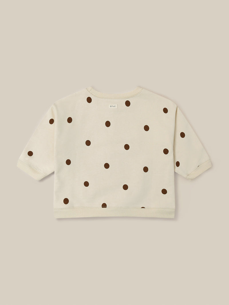 baby and toddler undyed cotton sweatshirt in cream with brown dots