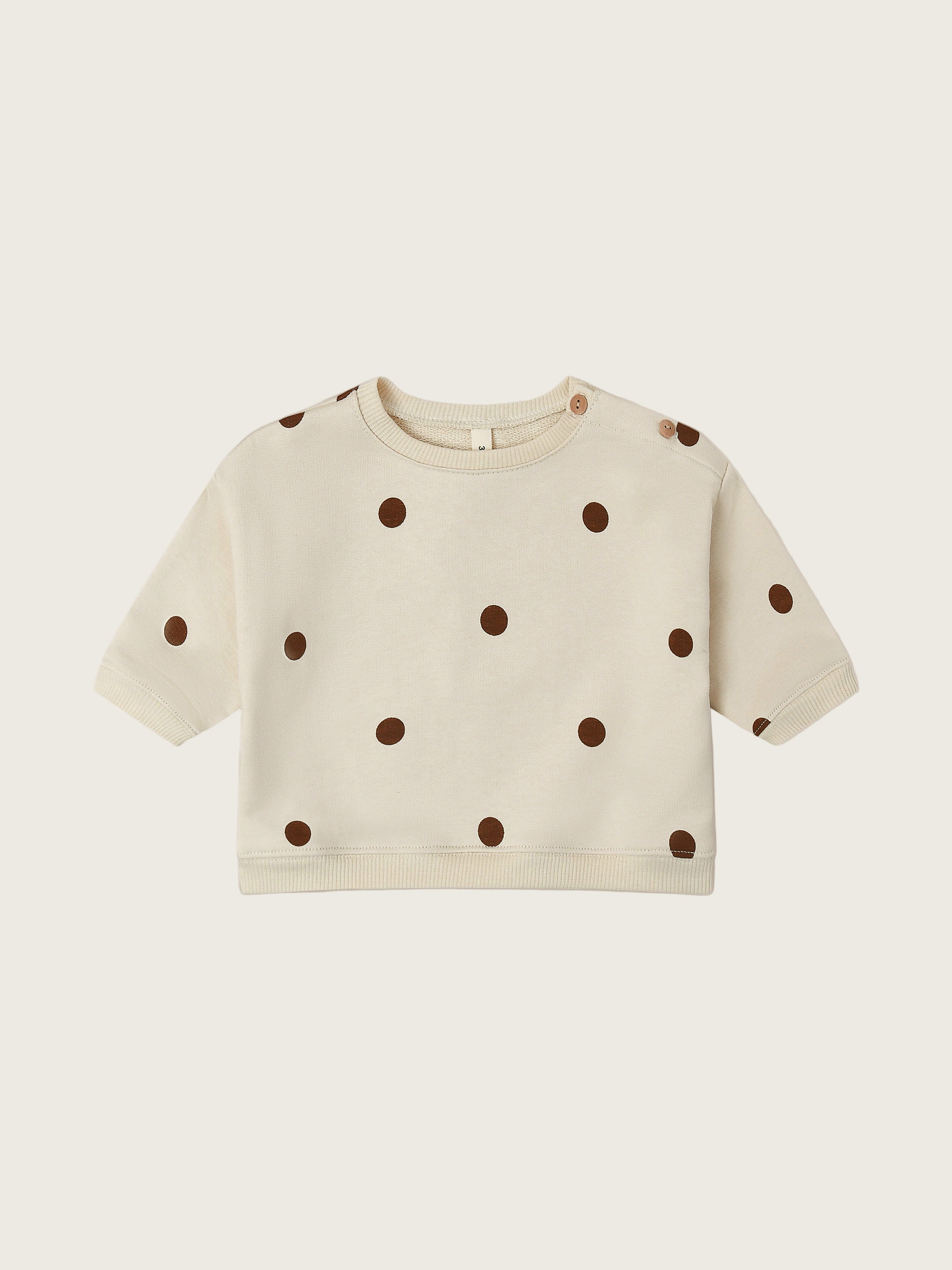 baby undyed cotton sweatshirt in cream with brown dots and two buttons on left shoulder