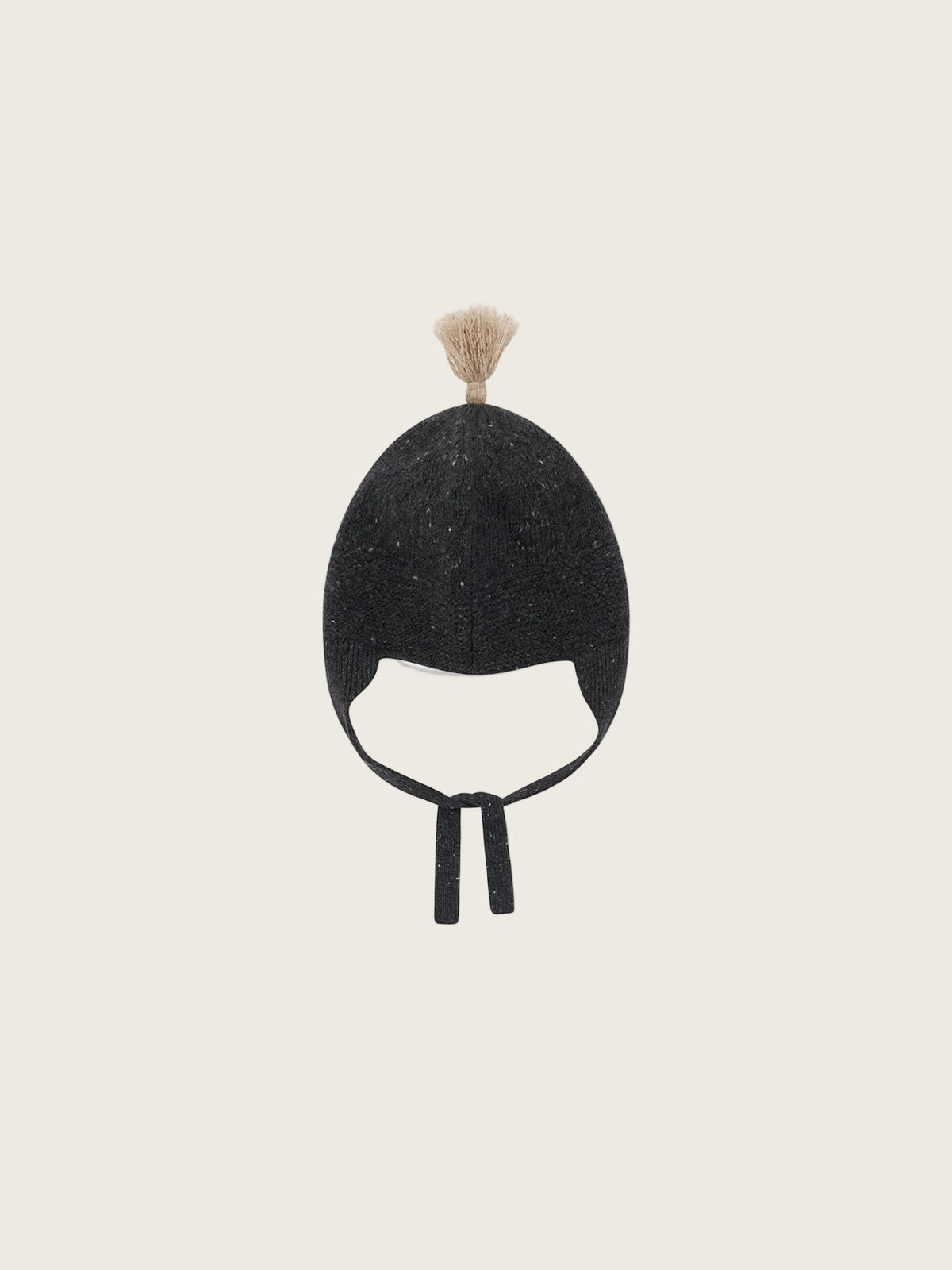 A black knit winter hat with ear loops and a small beige tassel on top, shown against a plain white background.