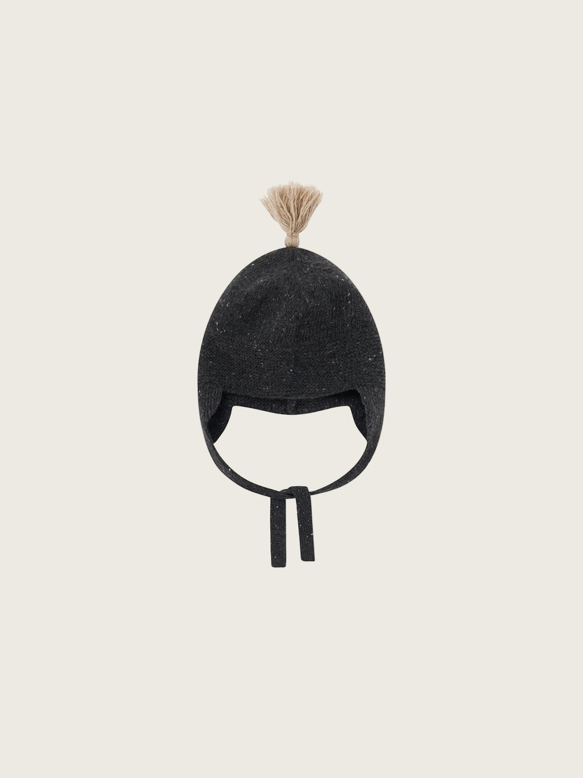 A dark charcoal gray knit winter hat with ear flaps and a small beige pom-pom on top, shown against a plain white background.