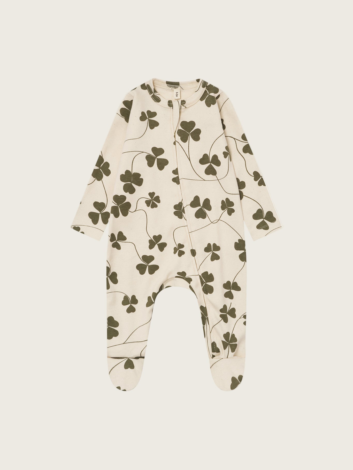 baby cream undyed cotton zip sleepsuit with green clover print