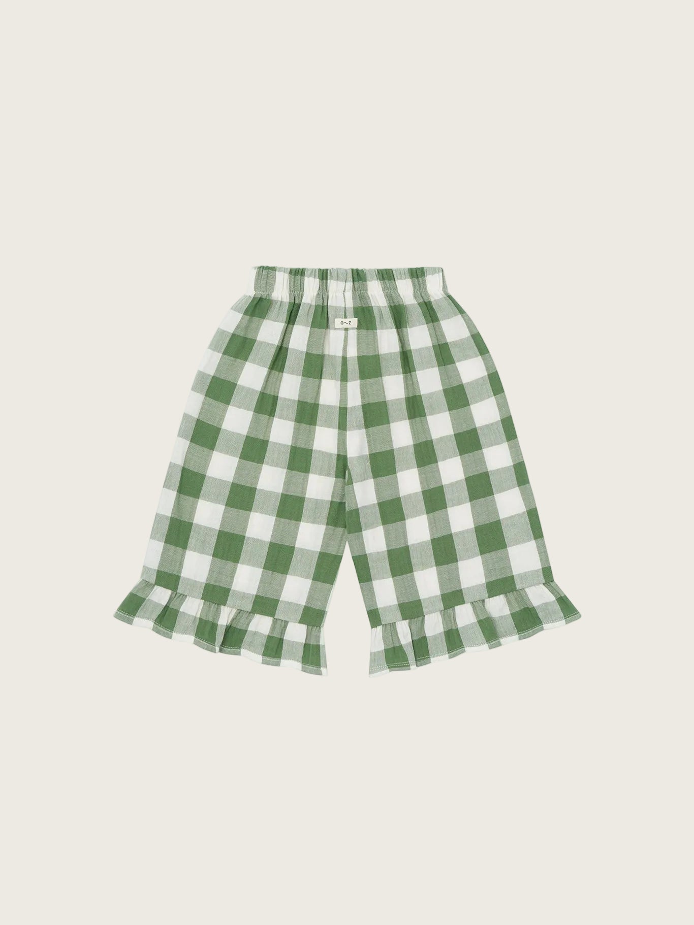Green and white checkered pants on a white background