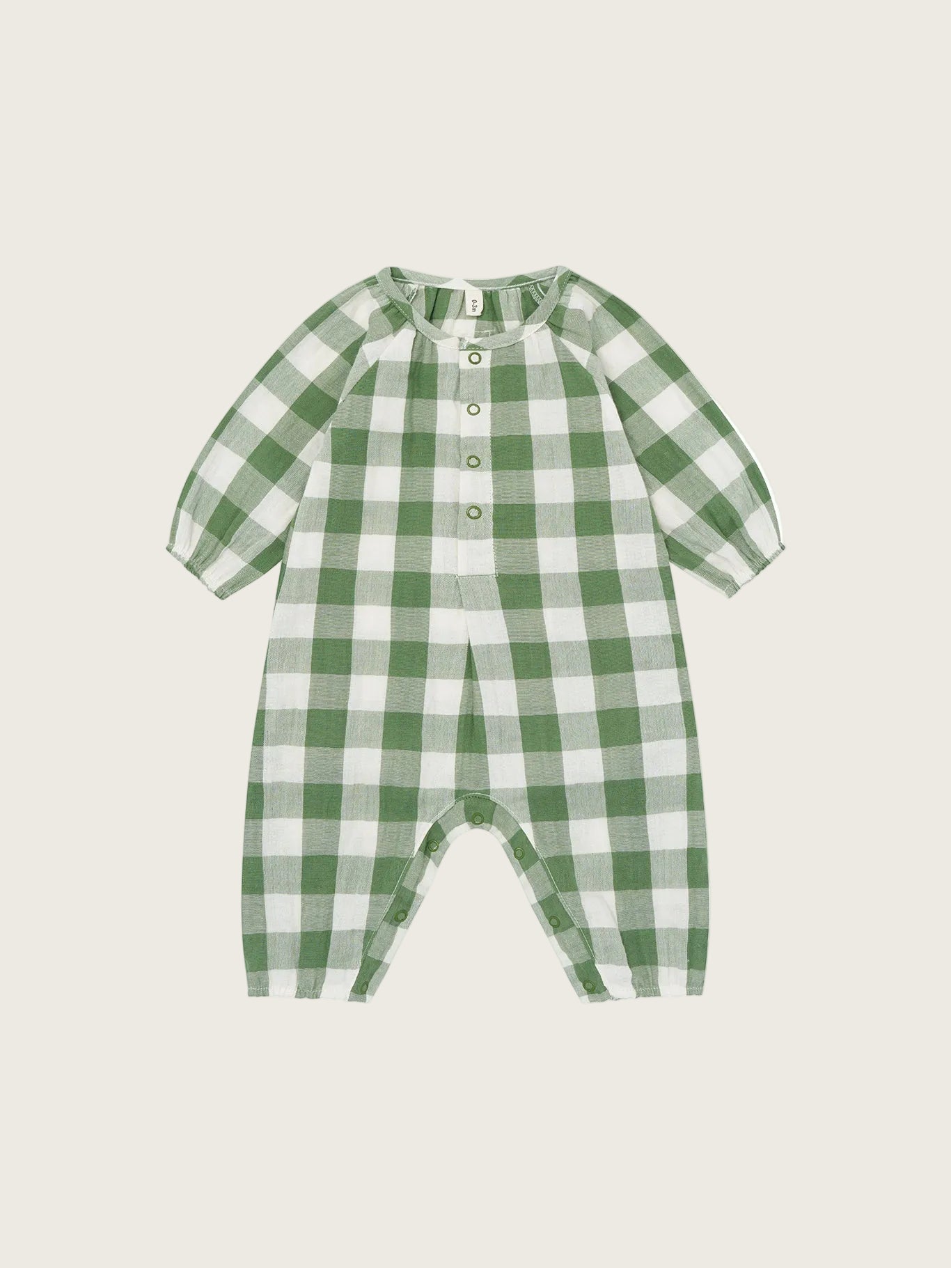 Green and white checkered baby romper on a white background