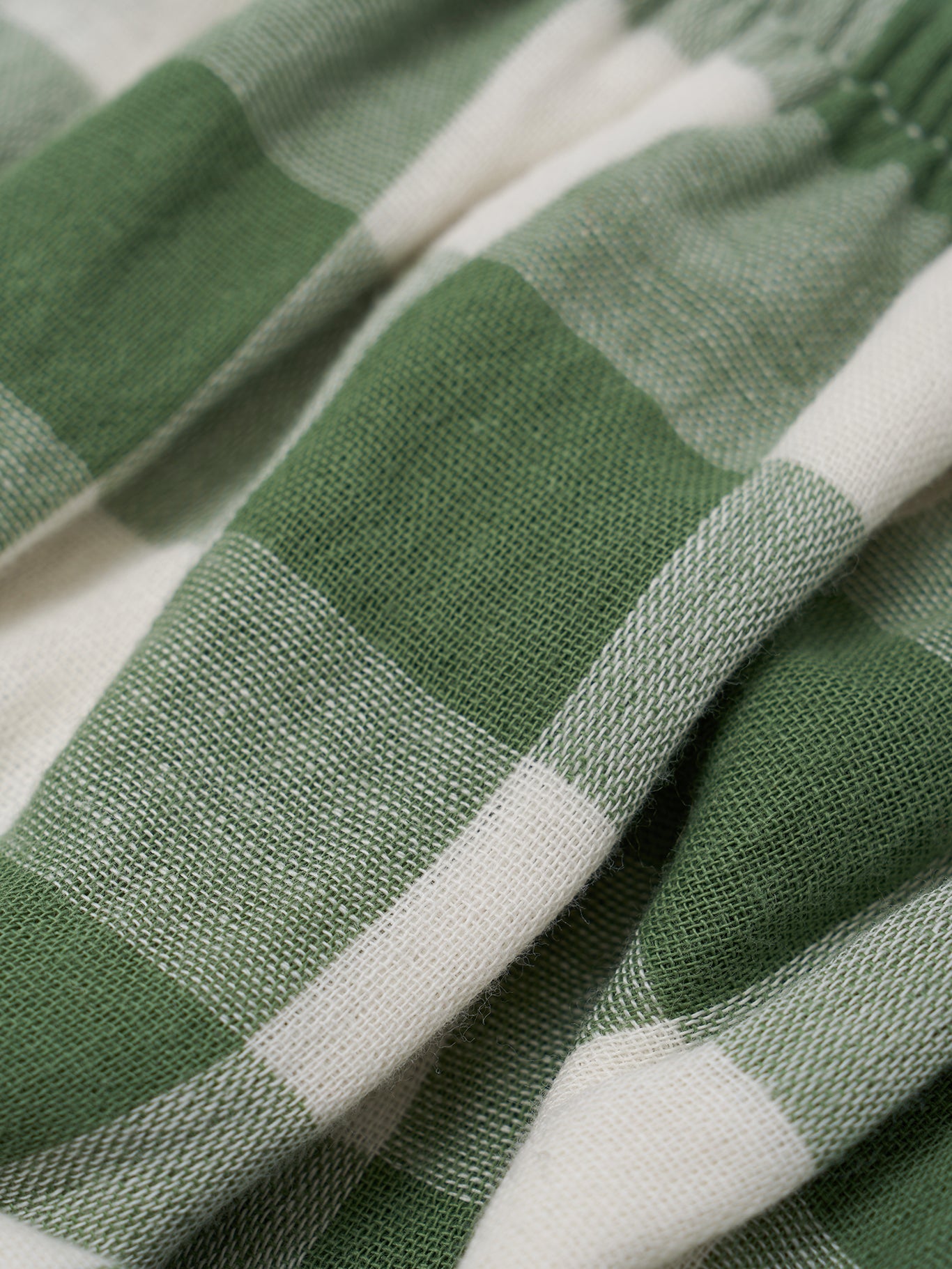 Close-up of green and white striped fabric