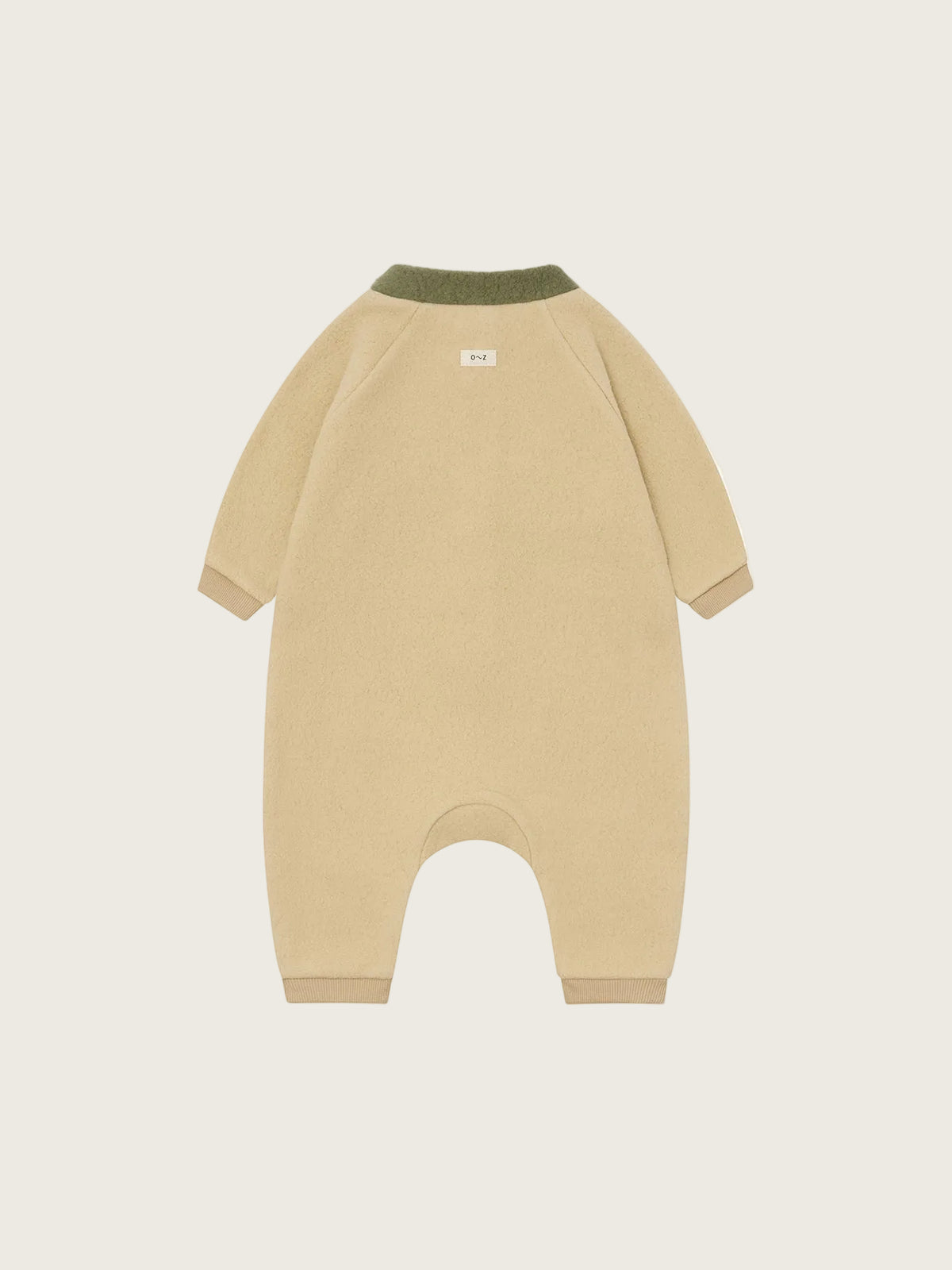 A long-sleeve baby romper in a light beige color, featuring an olive green ribbed collar and matching beige cuffs and foot openings, shown flat against a light cream background.