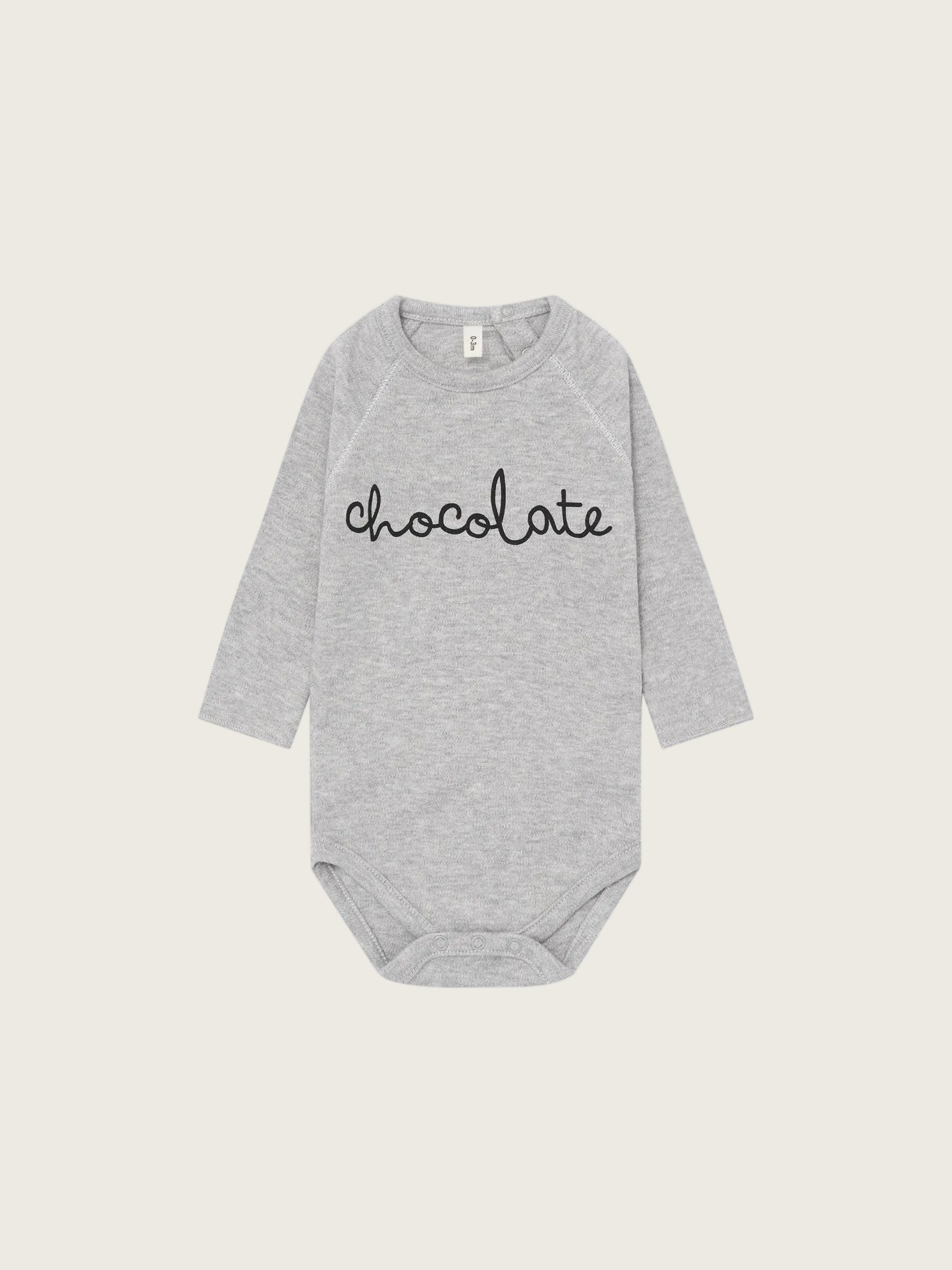 Gray baby onesie with 'chocolate' text on a white background