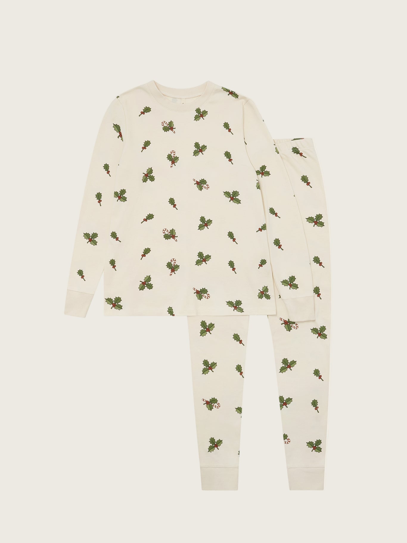 Holly patterned pyjama set on a beige background