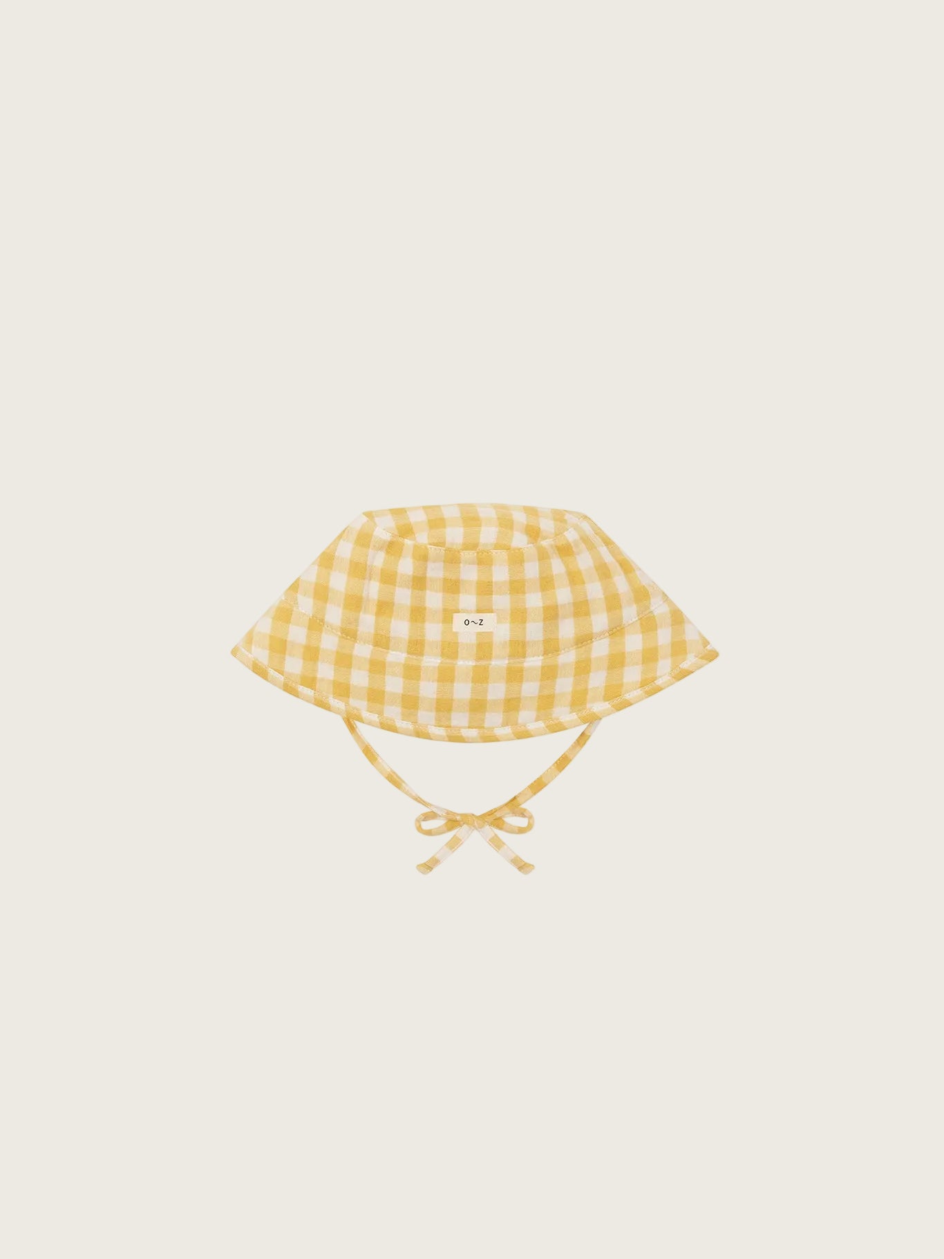 Yellow checkered baby sun hat on a white background