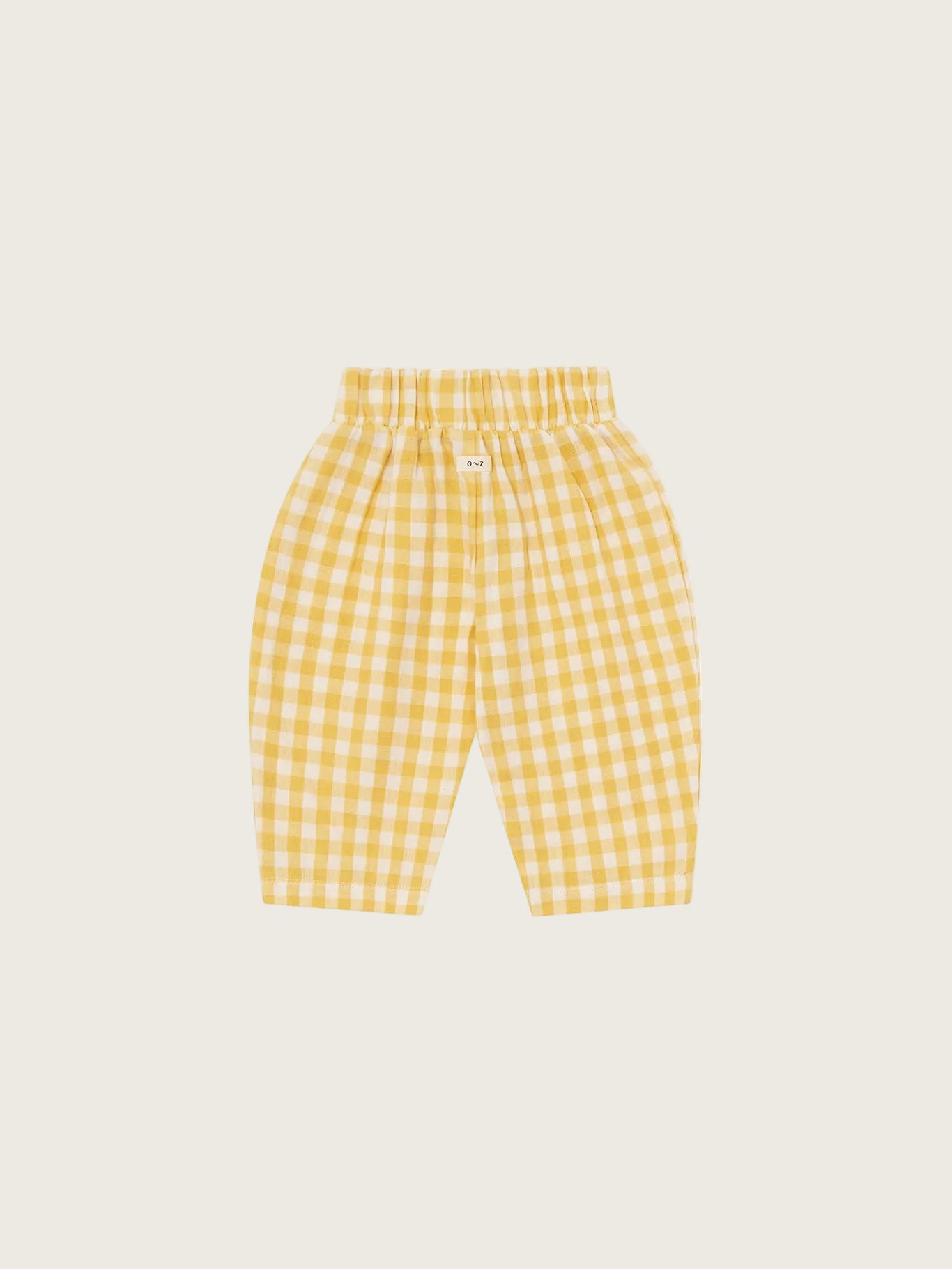 Yellow checkered pants on a white background
