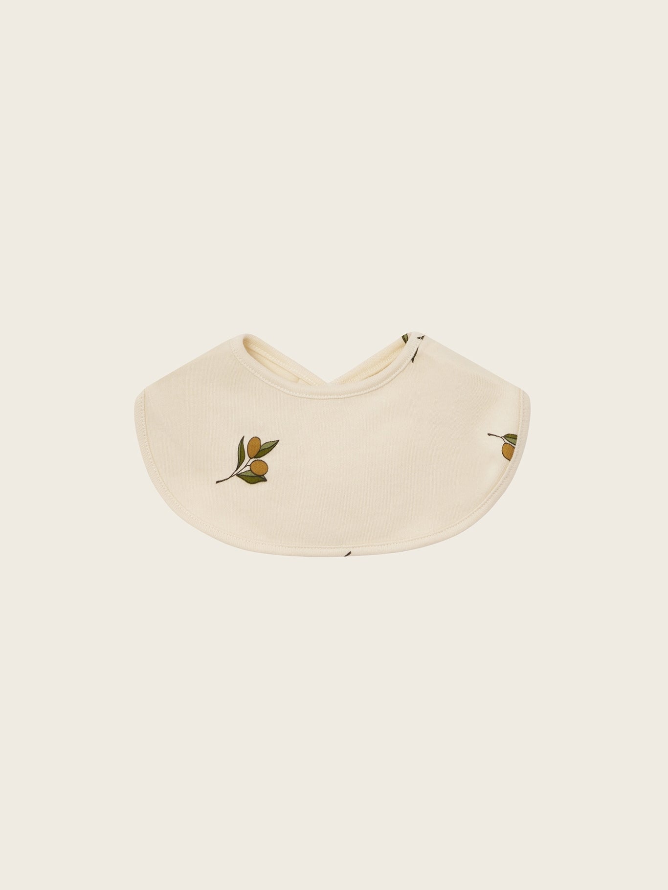 Beige visor with green leaf and olive designs on a white background