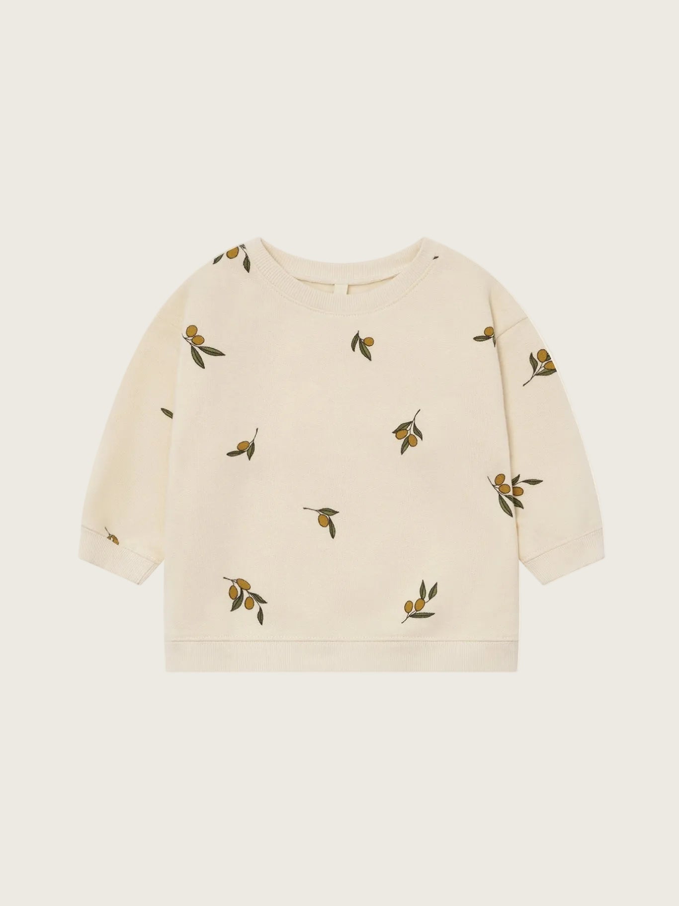 Beige sweater with olive prints on a white background