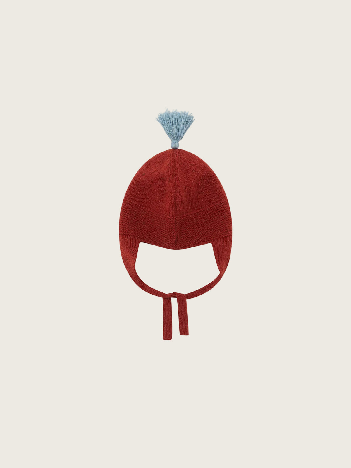A red knit winter hat with ear flaps and a small light blue pom-pom on top, shown against a plain white background.