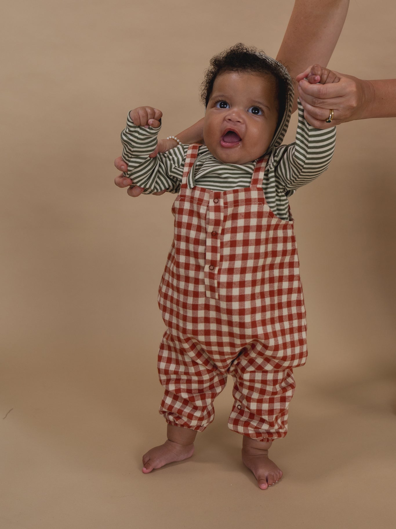 baby in paprika red and cream gingham flannel salopette with fern green striped sweatshirt