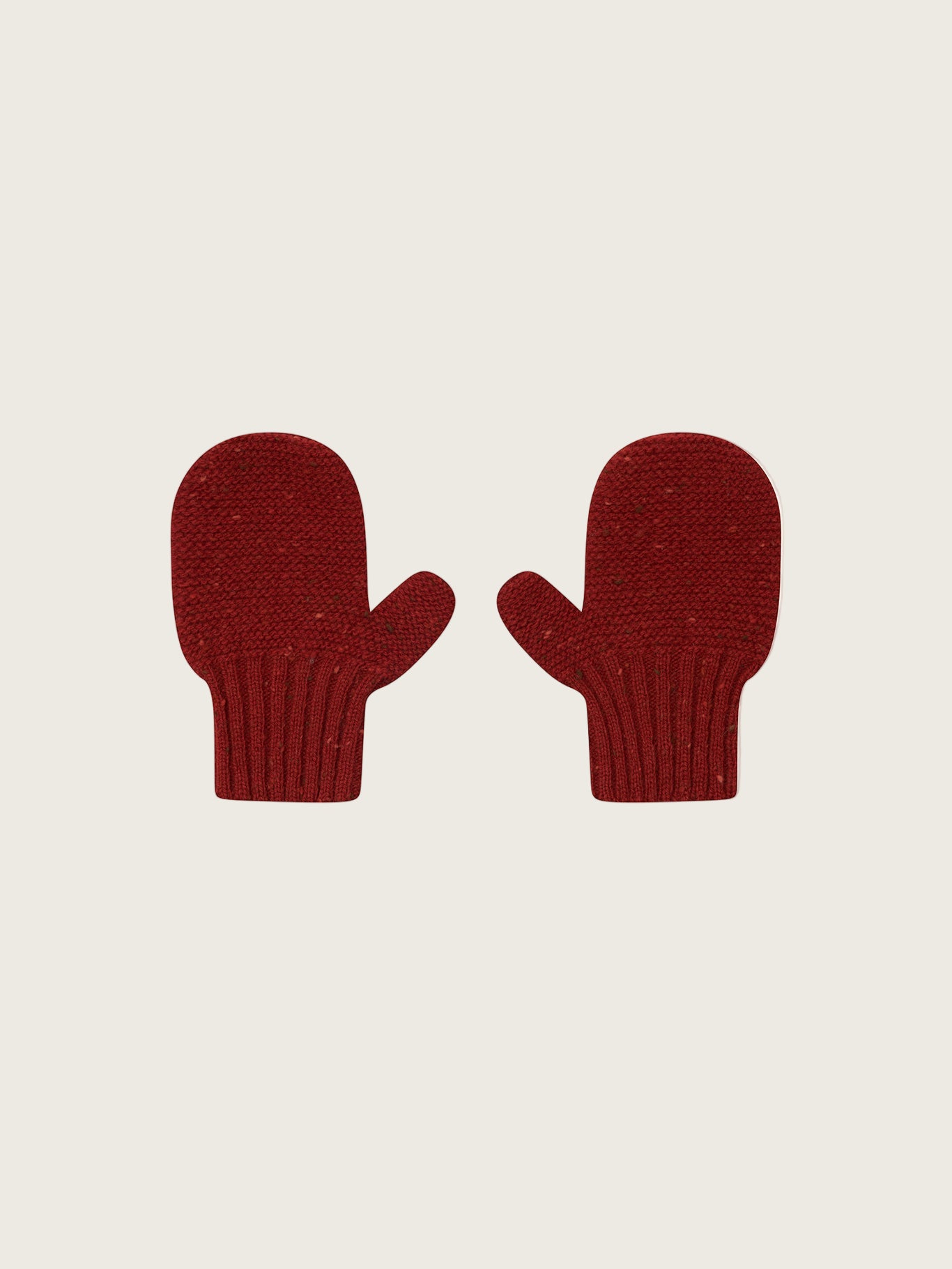 baby and toddler knitted wool mittens in paprika red with ribbed cuffs