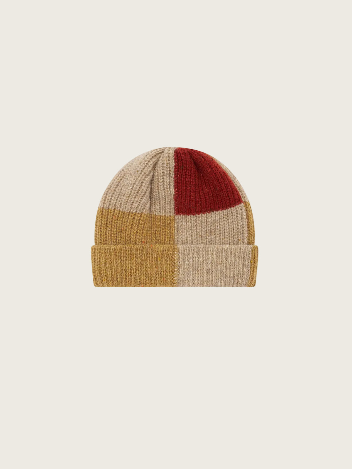 A ribbed knit beanie hat with a patchwork design in beige, mustard yellow, and deep red, shown against a plain white background.