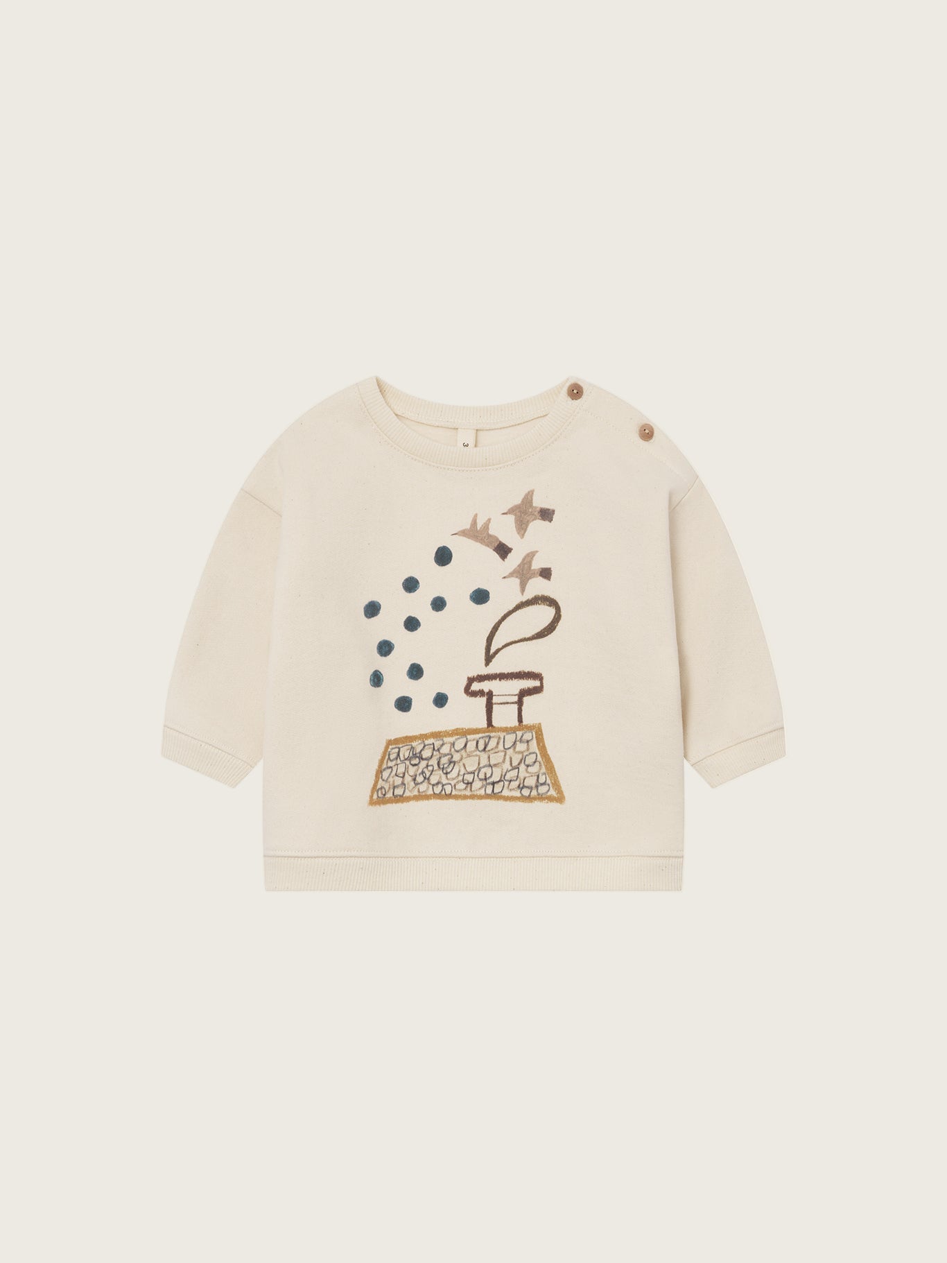 baby undyed cotton sweatshirt with shoulder buttons, birds and blue dots graphic above a rooftop
